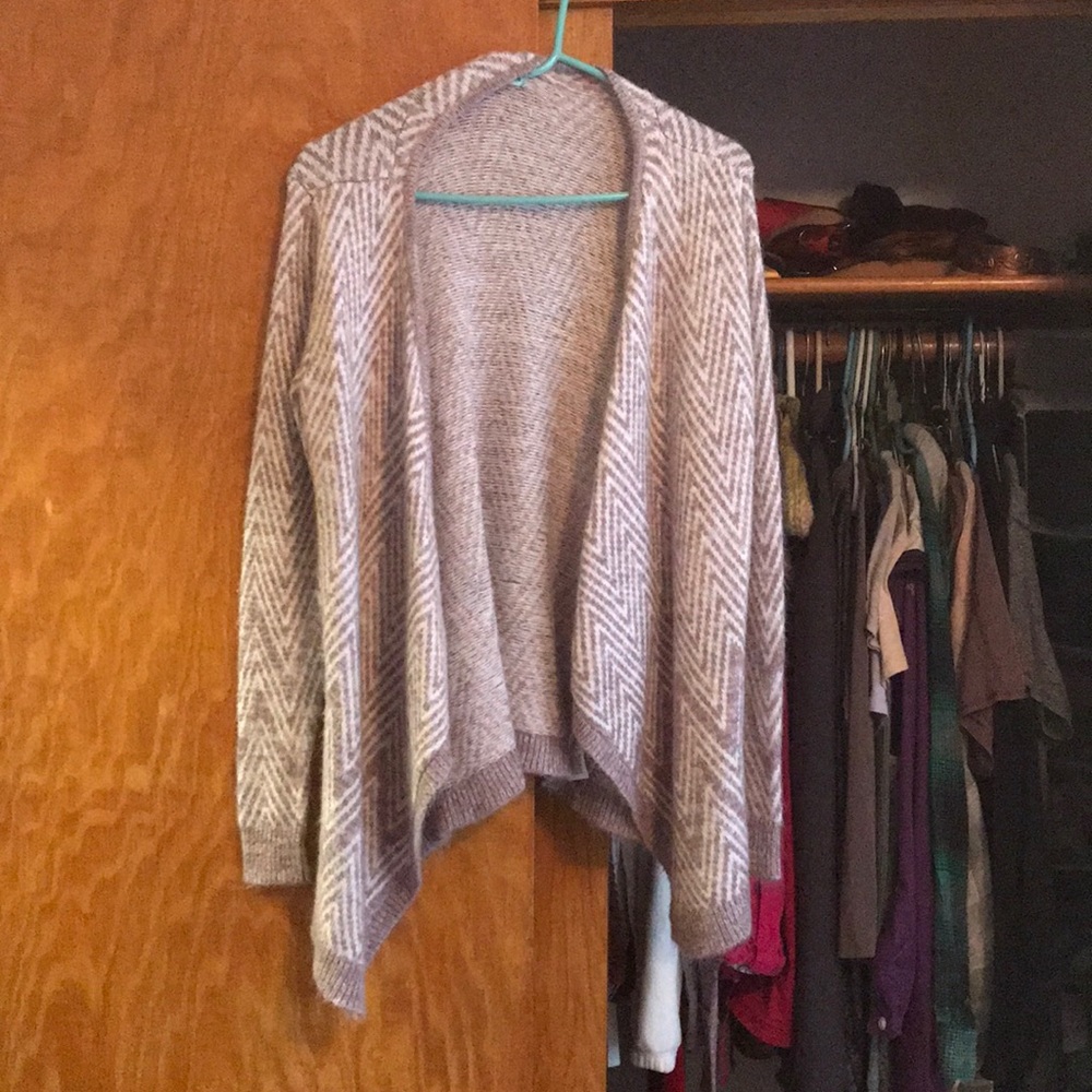 Maurice’s purple and white sweater